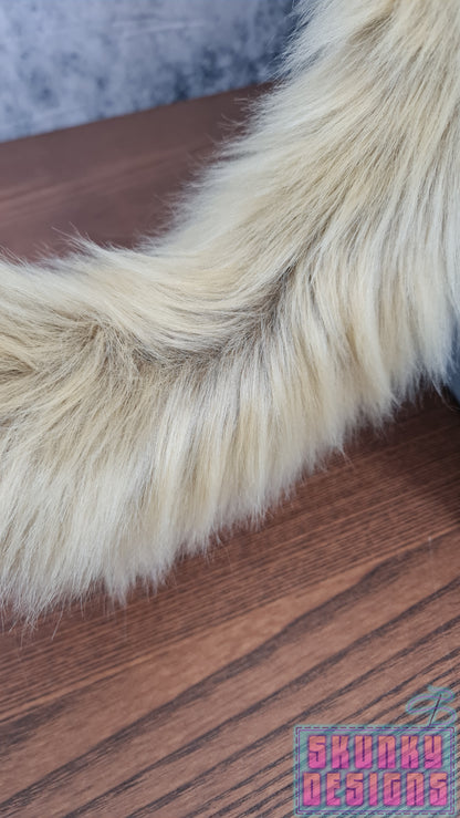 Feline tail - dark brown fur with light tips